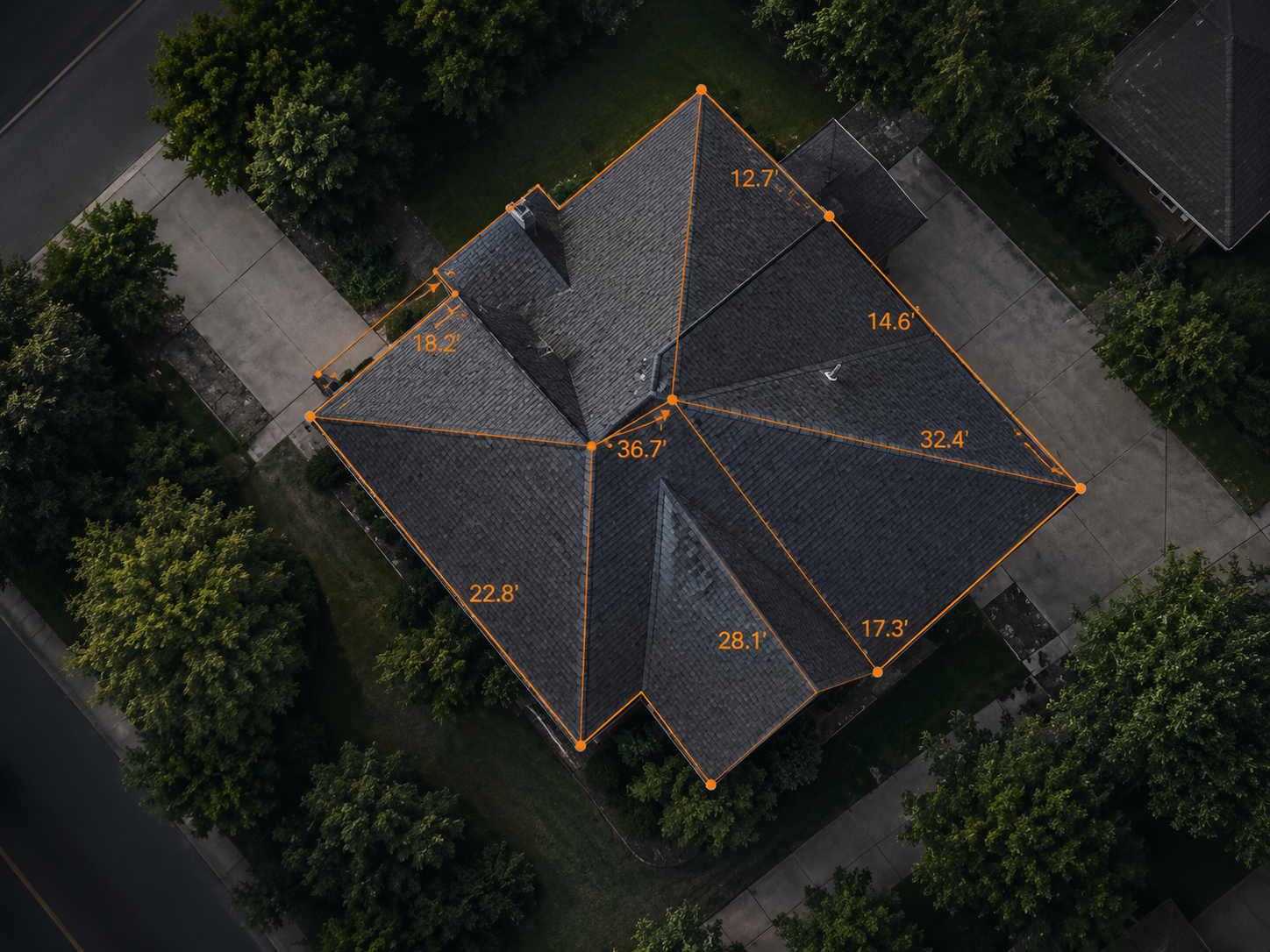 Aerial roof measurement overlay with ridge, hip, and eave lengths